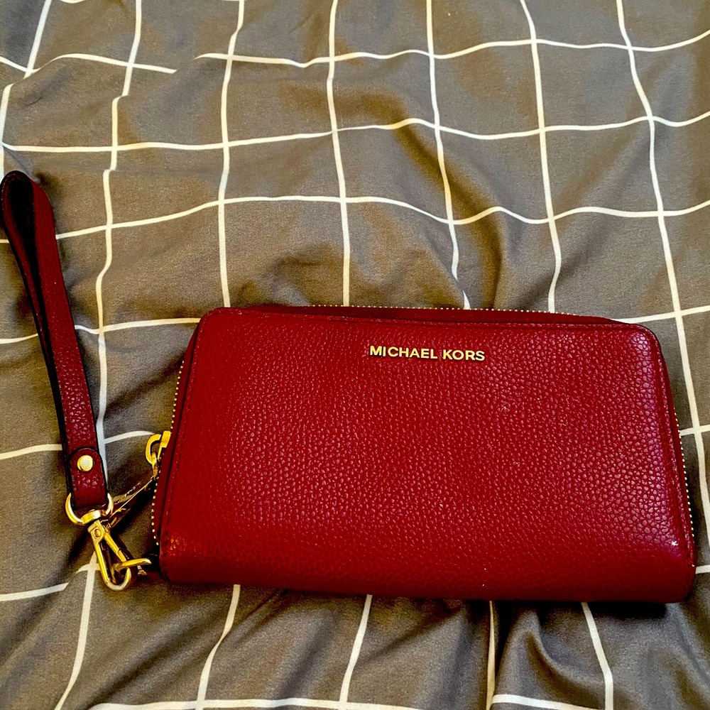 MICHAEL KORS red wristlet.